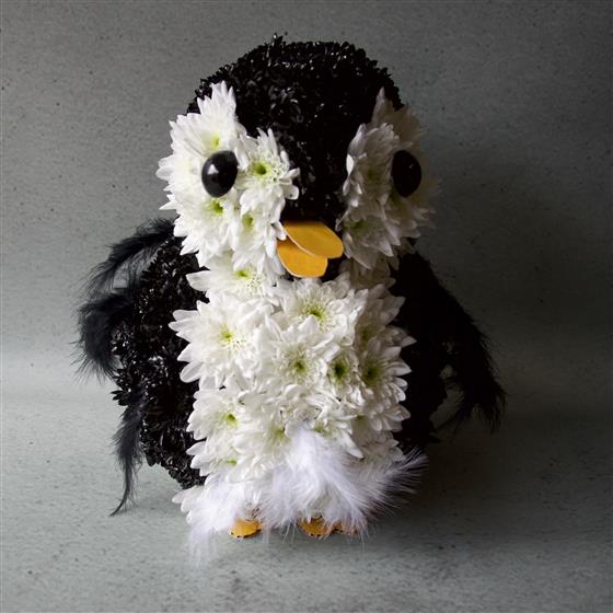 small penguin floral tribute
